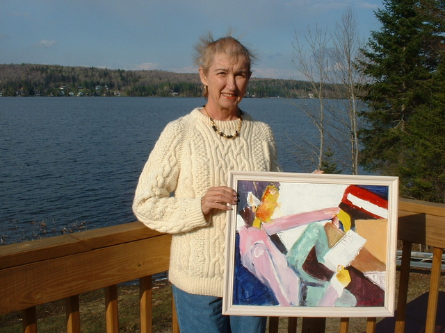 Patricia Klinefelter Holding a Painting